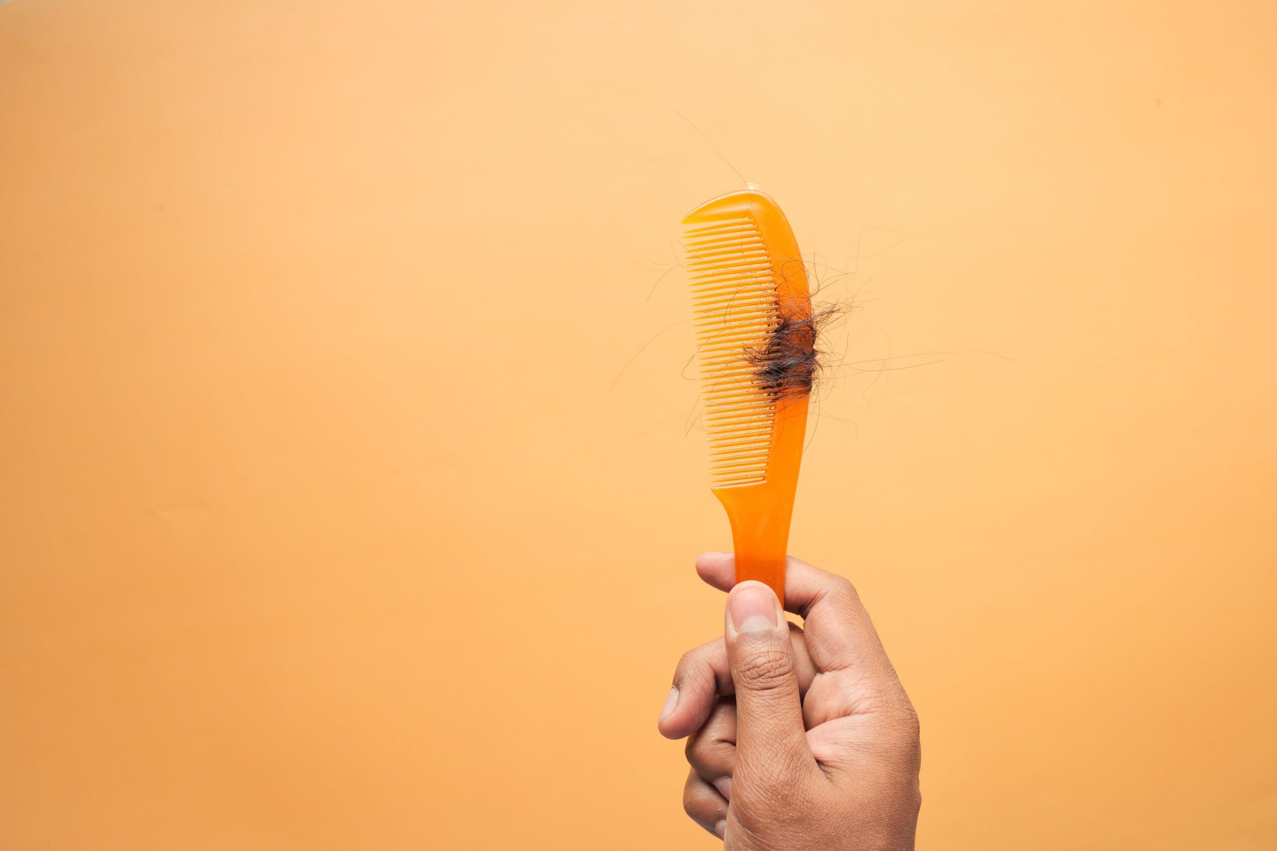 Why Your Hair Might Be Falling Out More Than Usual